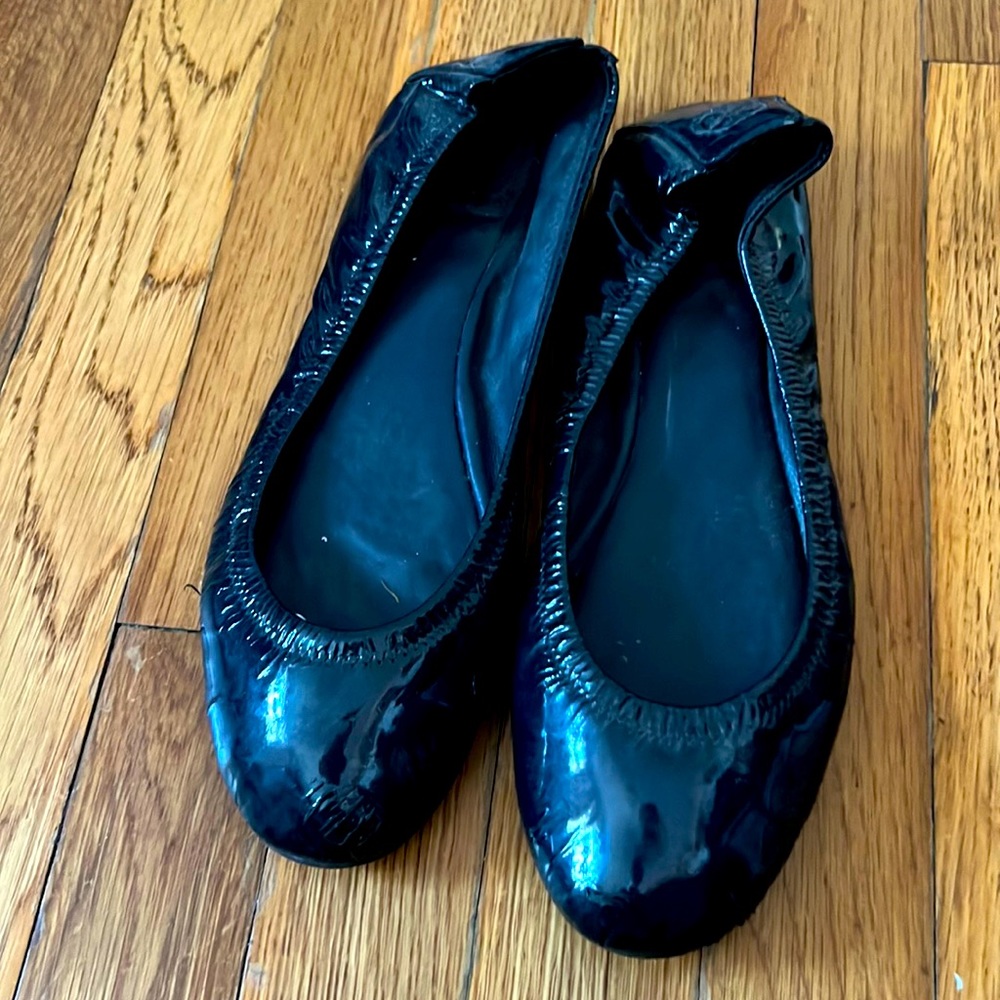Tory Burch patent leather slides.